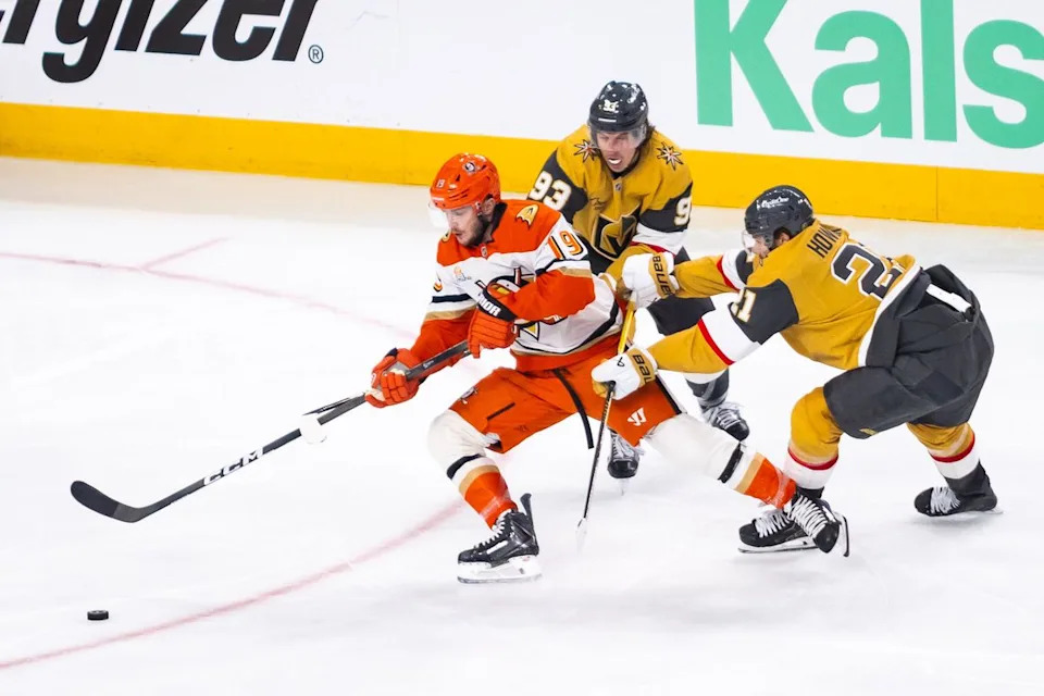 Anaheim Ducks right-wing Troy Terry (19) skates past Vegas Golden Knights center Brett Howden (21) and right-wing Mitch Marner (93) during game 2 of a NHL playoff game between the Vegas Golden Knights and the Anaheim Ducks, Wednesday May 6, 2026 in Las Vegas, Nev.