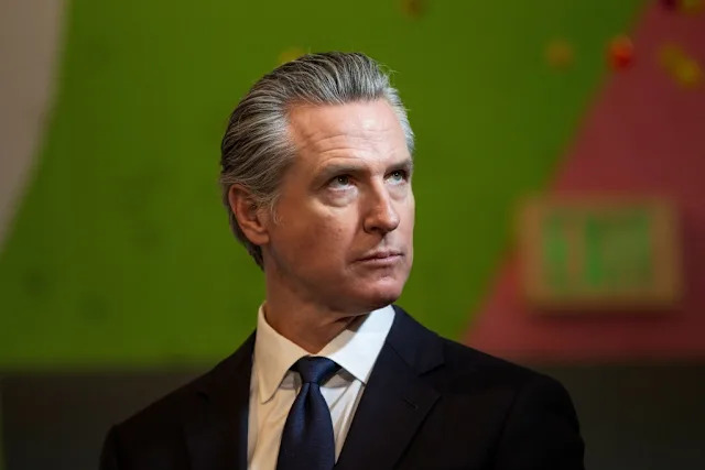 Gavin Newsom looks on as he holds a press conference in San Francisco. REUTERS