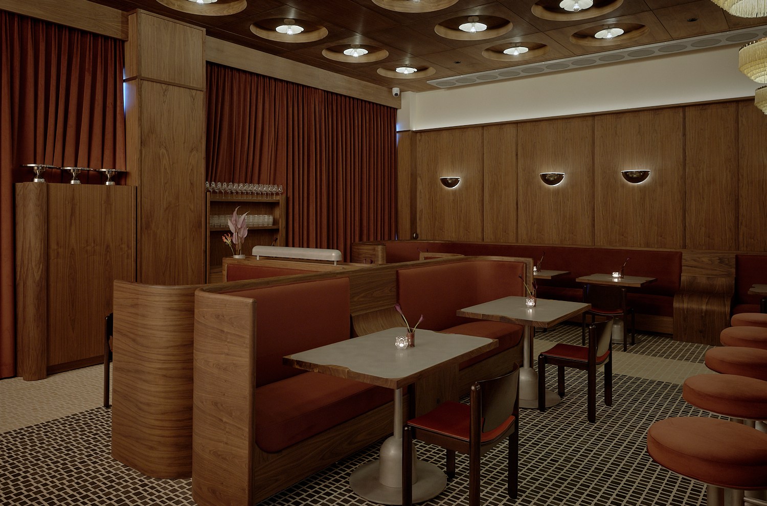 Dining room at Bar di Bello with banquettes and tile floors