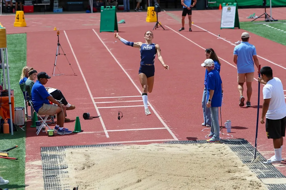 Athletes sprint down a runway, launch off a designated take-off board, and leap as far as they can into a sand pit. Rafael Fontoura for CA Post