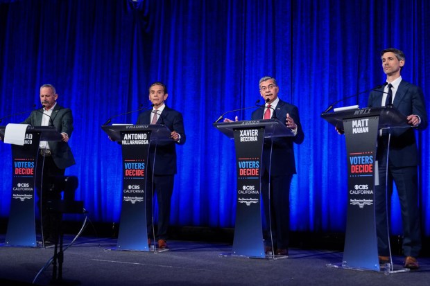 Xavier Becerra, second from right, speaks as Chad Bianco, left, Antonio Villaraigosa and Matt Mahan listen during a California gubernatorial debate hosted by CBS Bay Area and the San Francisco Examiner in San Francisco, Thursday, May 14, 2026. (AP Photo/Godofredo A. Vásquez, Pool)