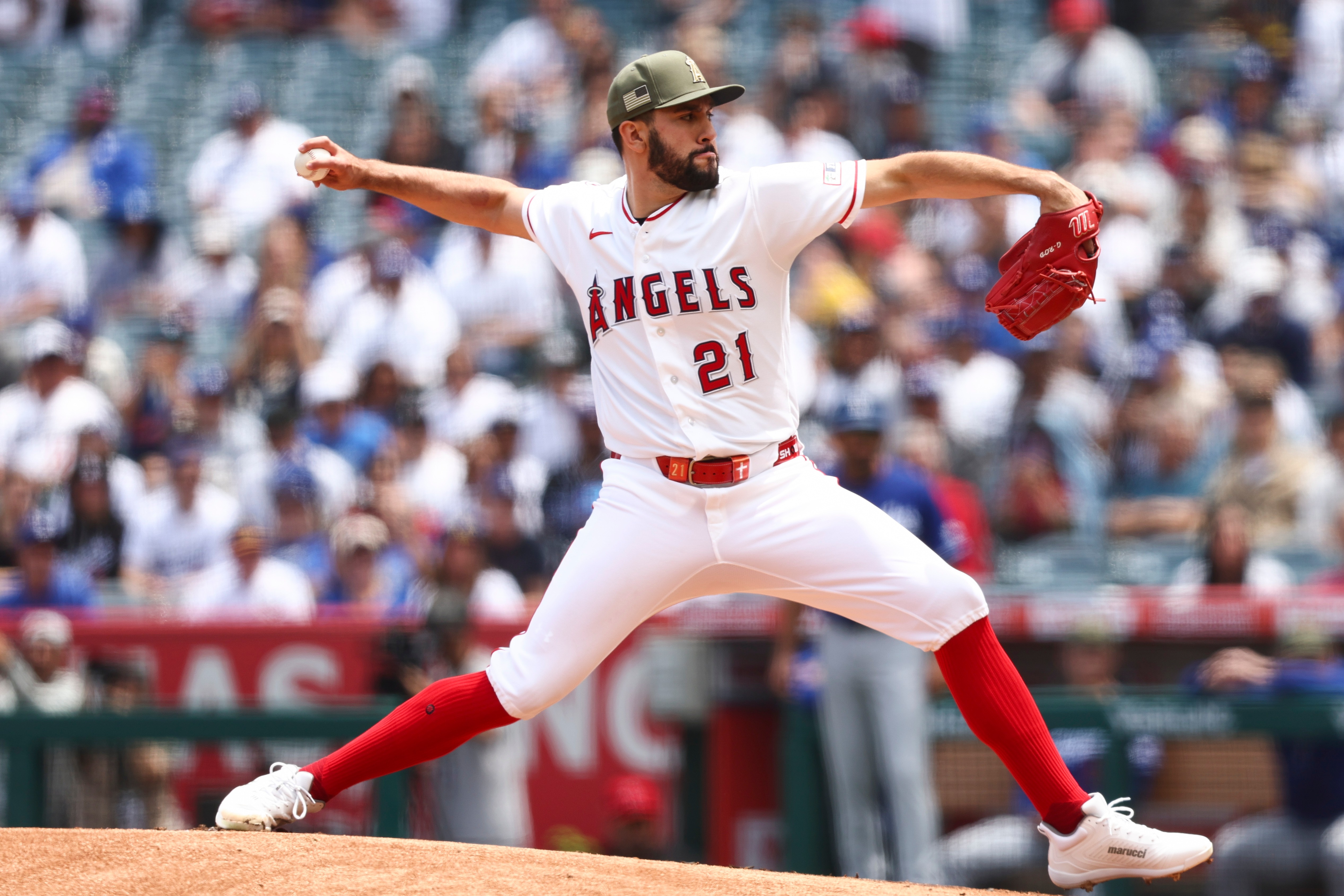 Angels pitcher Grayson Rodriguez throws to a Dodgers batter during...