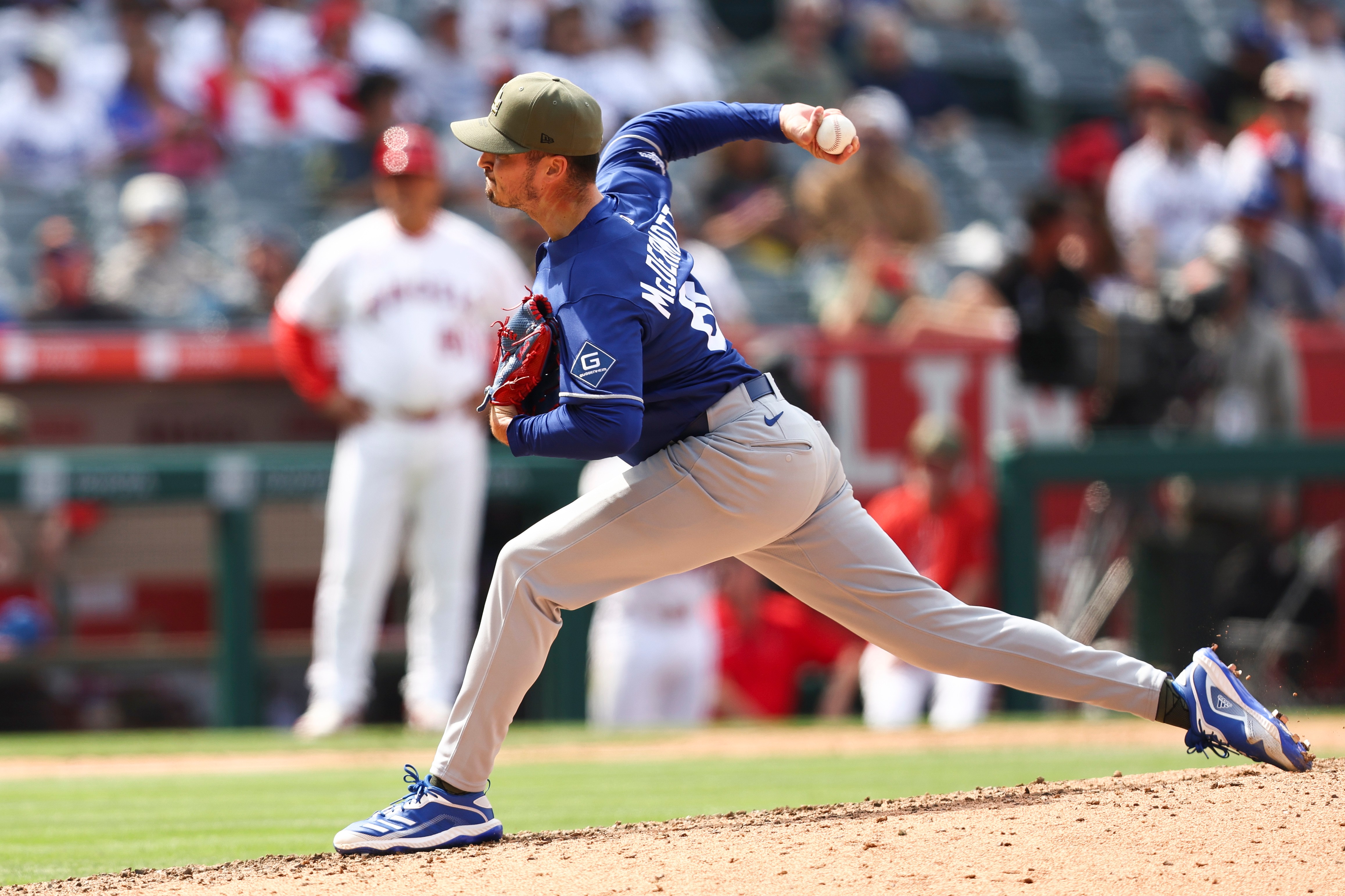 Dodgers pitcher Chayce McDermott throws to a Angels batter during...
