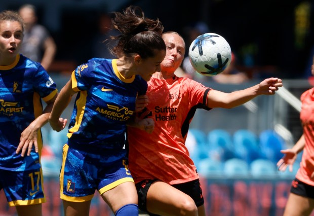 Bay FC's Taylor Huff (7) fights for the ball against Utah Royals FC's Nuria Rabano (14) in the first half at PayPal Park in San Jose, Calif., on Sunday, May 10, 2026. (Nhat V. Meyer/Bay Area News Group)