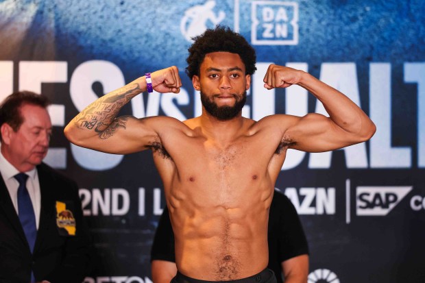 Amari Jones, of Oakland, left, flexes his muscles on the scale during an official weigh-in ahead of his fight against Vincenzo Gualtieri, of Germany, at the Hayes Mansion in San Jose, Calif., Thursday, May 21, 2026. Jones, an undefeated middleweight contender, and Gualtieri, a former IBF middleweight world champion, will fight in a 12-round IBF title eliminator bout on Friday at the SAP Center in San Jose. (Ray Chavez/Bay Area News Group)