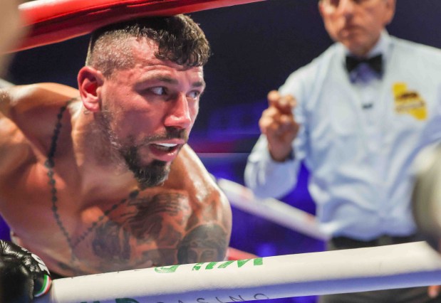 A referee gives a mandatory eight-count to Vincenzo Gualtieri, of Germany, after Amari Jones, of Oakland, knocked him down during the third round of their 12-round IBF title eliminator bout at the SAP Center in San Jose, Calif., Friday, May 22, 2026. Jones won by KO in the third round. (Ray Chavez/Bay Area News Group)