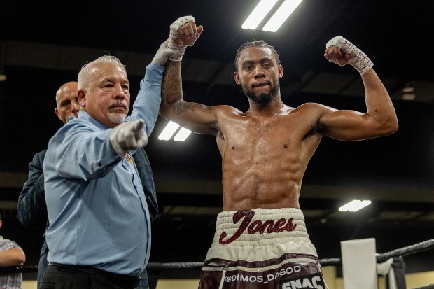 Amari Jones is declared the winner after knocking out Daniel Echeverria in a boxing match, Saturday, Aug. 31, 2024, at the Oakland Marriott Center in Oakland, Calif. (Karl Mondon/Bay Area News Group)