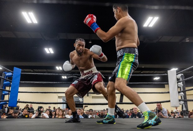 Amari Jones, left, boxes Daniel Echeverria, Saturday night, Aug. 31, 2024, at the Oakland Marriott Center in Oakland, Calif. (Karl Mondon/Bay Area News Group)