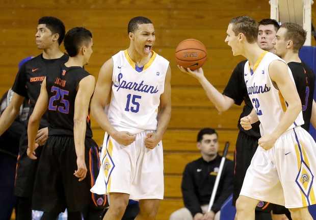 San Jose State guard Brandon Clarke (15) celebrates with forward Ryan Welage after scoring against Boise State during the second half of an NCAA college basketball game in San Jose, Calif., Saturday, March 5, 2016. San Jose State won 68-63. (AP Photo/Jeff Chiu)