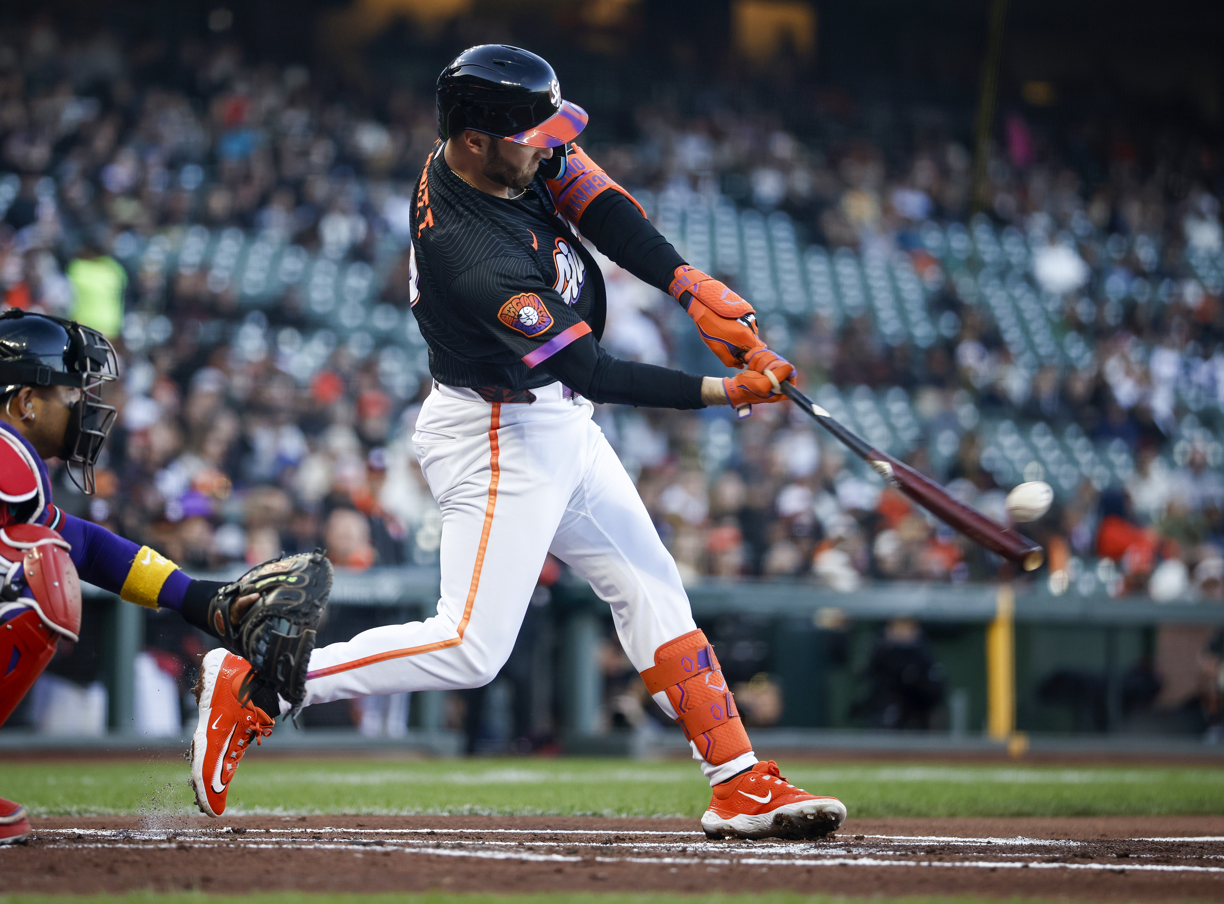 San Francisco Giants’ Casey Schmitt (10) hits a solo home...