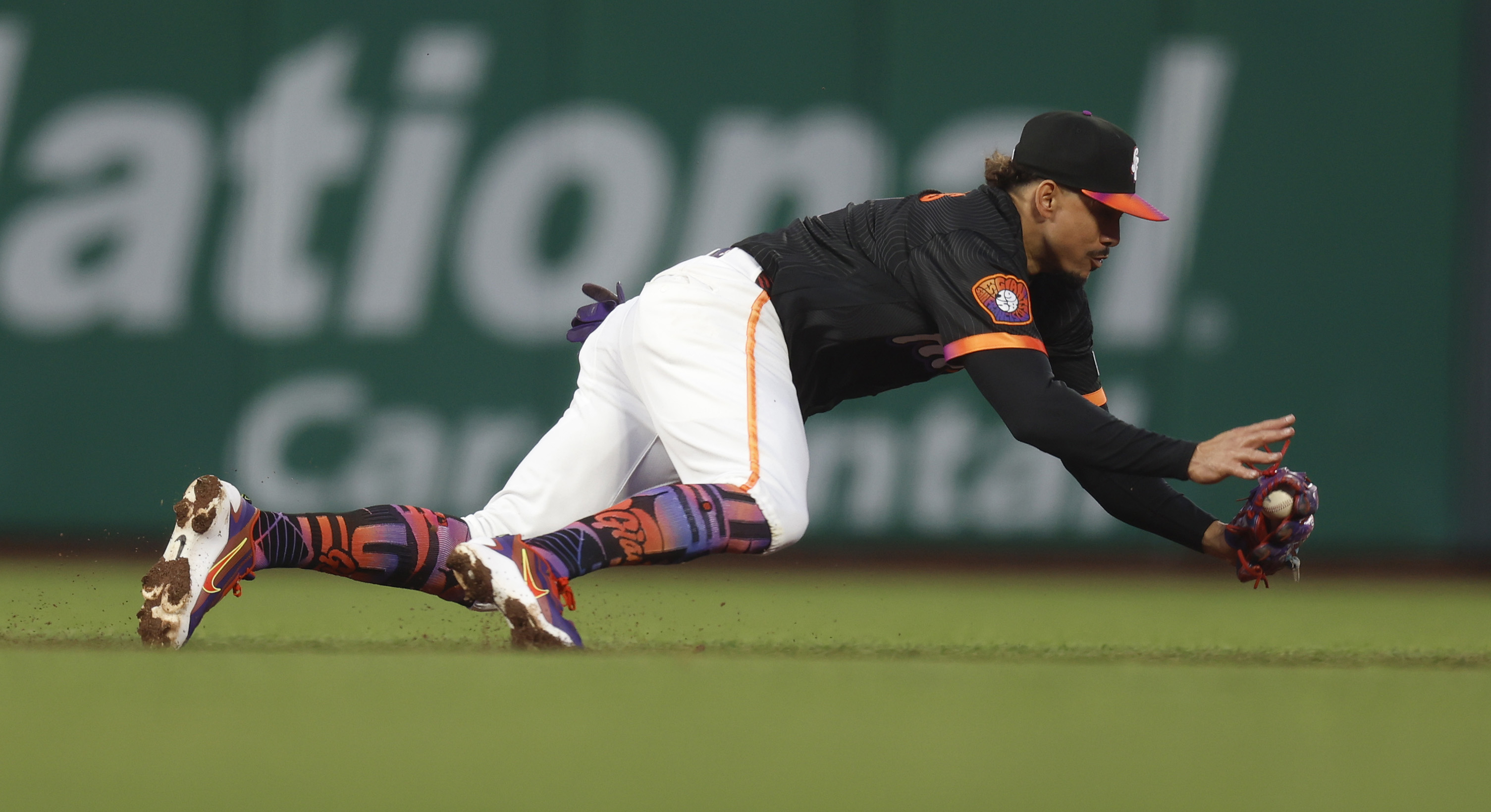 San Francisco Giants’ Willy Adames (2) makes a stop on...