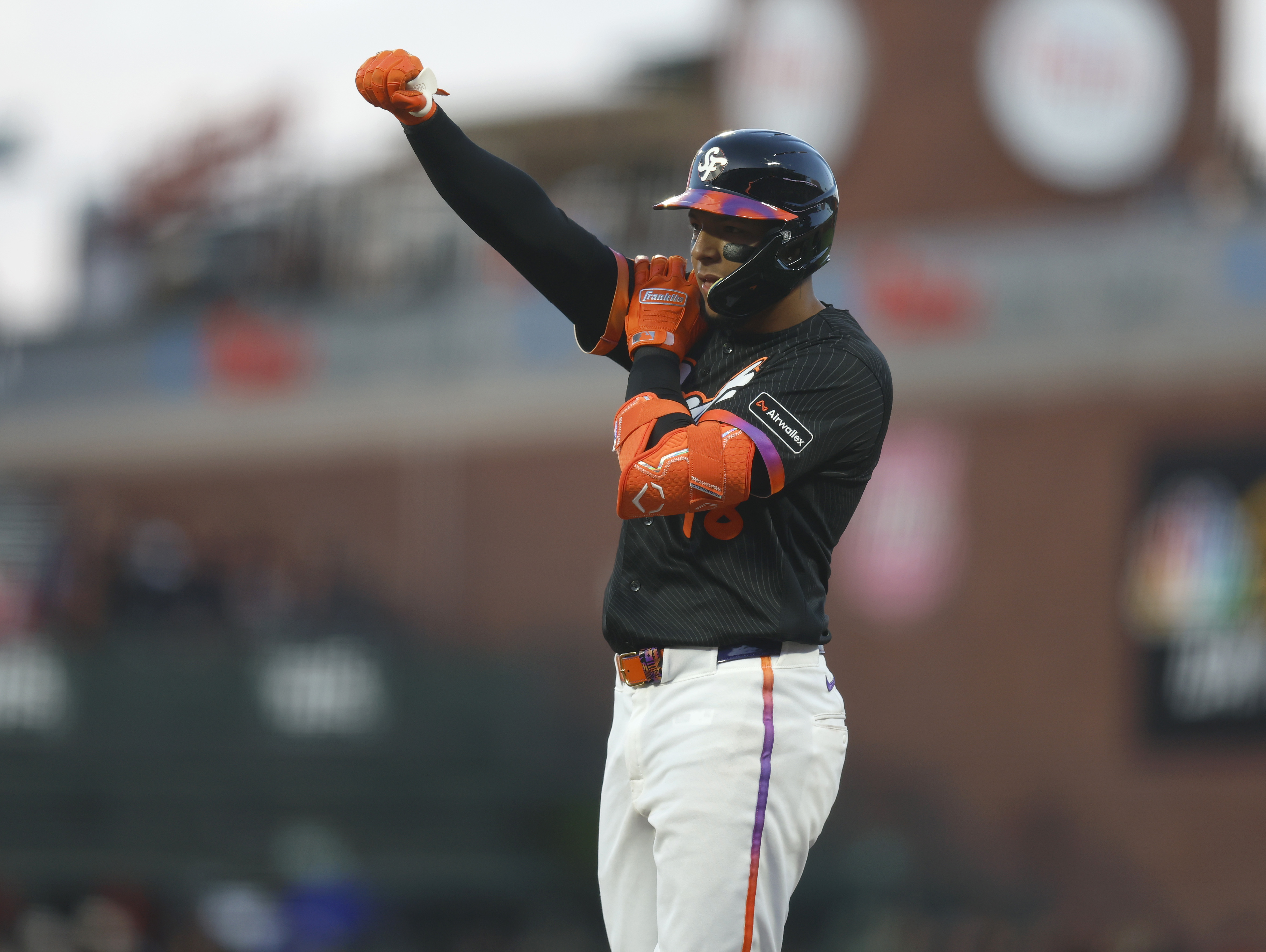 San Francisco Giants’ Victor Bericoto (78) celebrates his first Major...