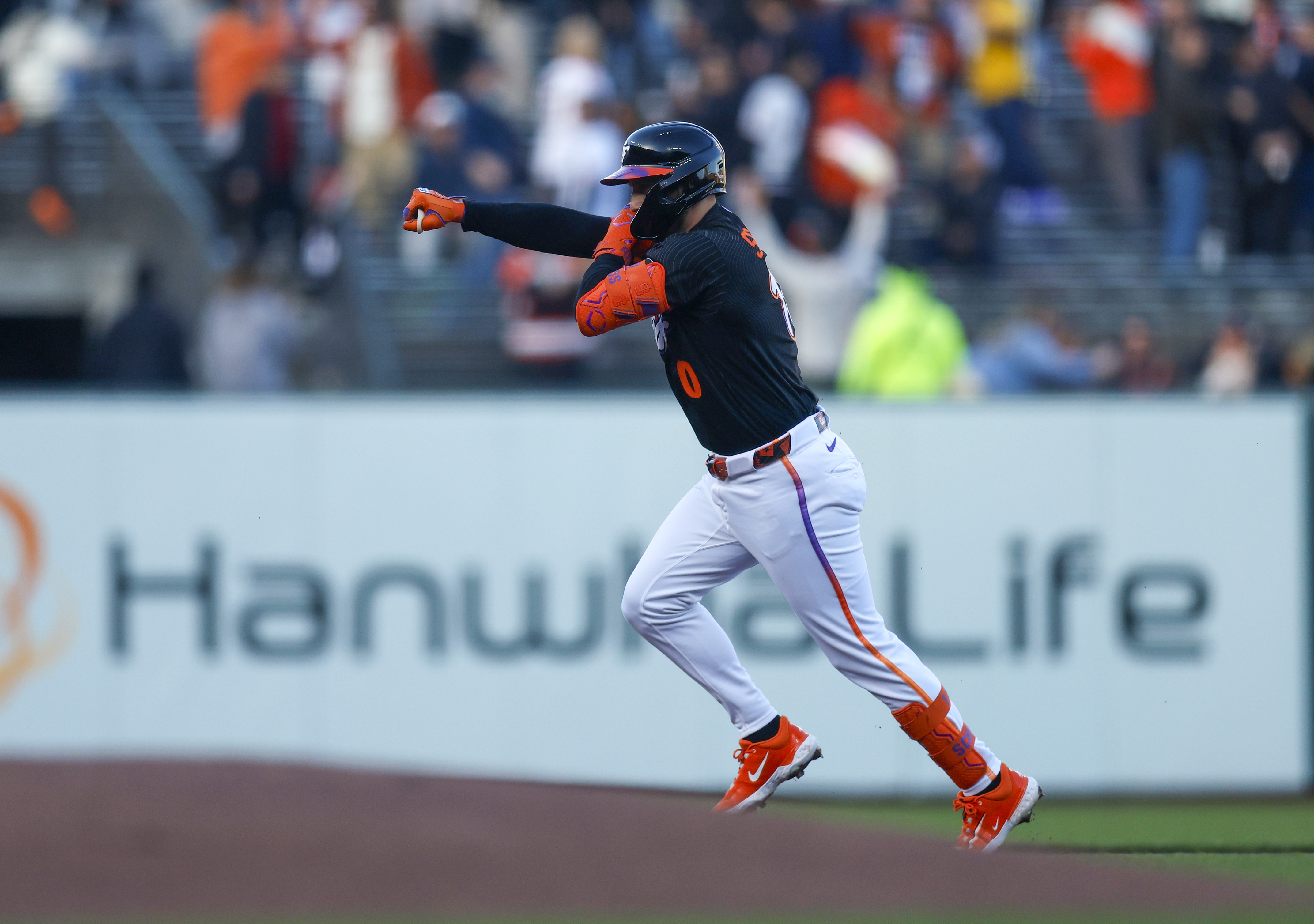 San Francisco Giants’ Casey Schmitt (10) celebrates his solo home...