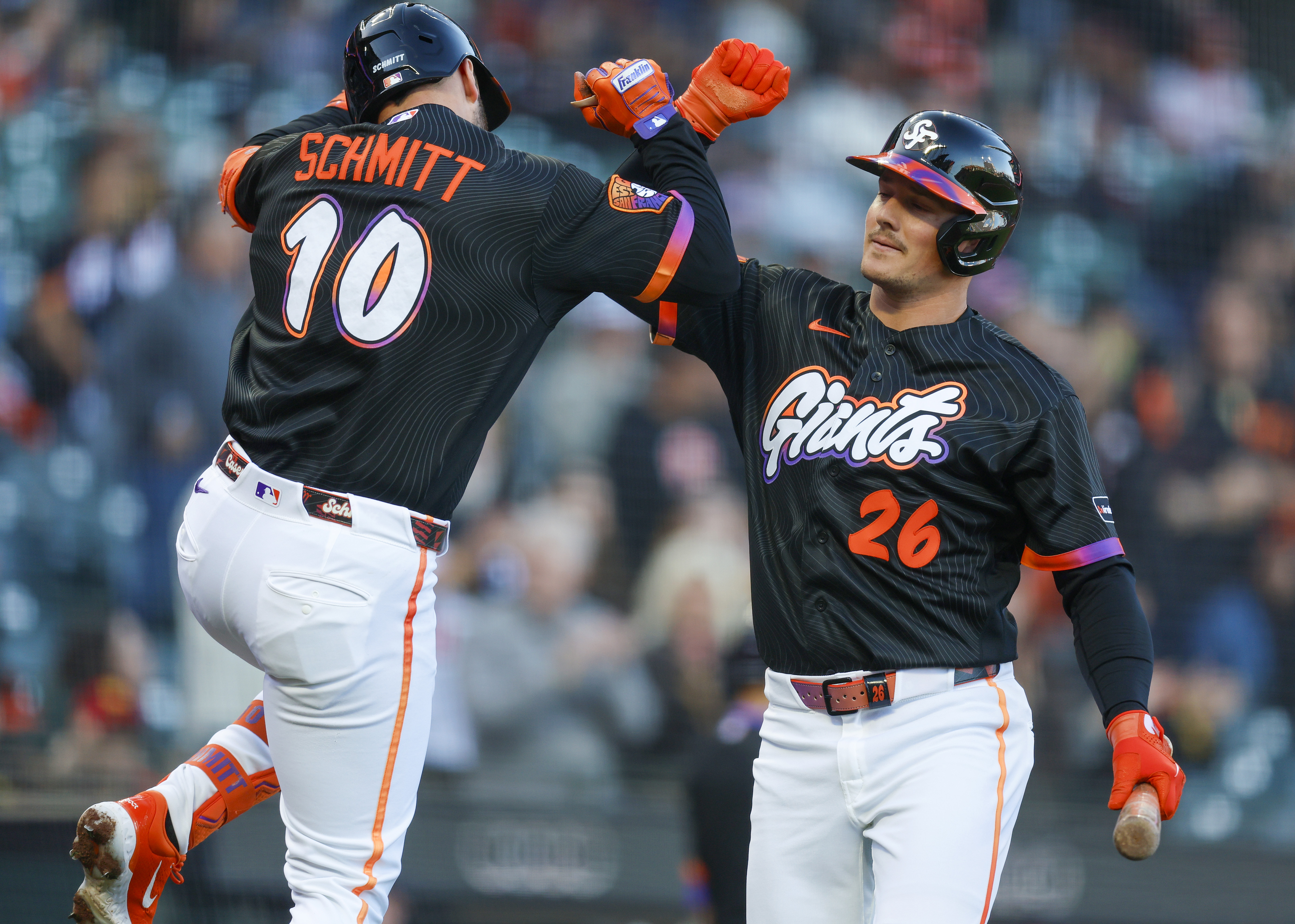 San Francisco Giants’ Casey Schmitt (10) celebrates his solo home...