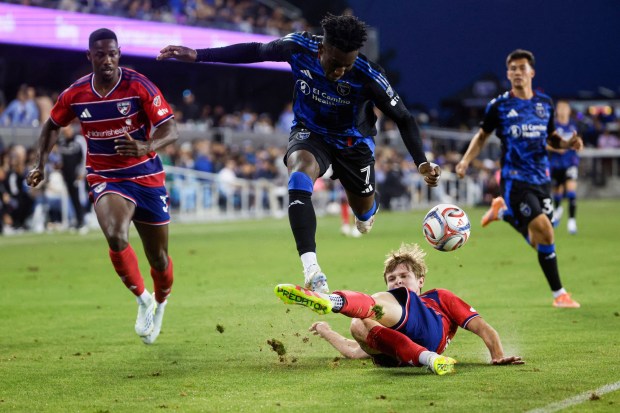 San Jose Earthquakes' Ousseni Bouda (7) is tackled by Dallas FC's Nolan Norris (32) in the first half at PayPal Park in San Jose, Calif., on Saturday, May 16, 2026.  (Shae Hammond/Bay Area News Group)