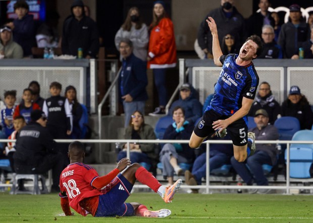 San Jose Earthquakes' Daniel Munie (5) falls while running with the ball against Dallas FC's Shaq Moore (18) in the second half at PayPal Park in San Jose, Calif., on Saturday, May 16, 2026.  (Shae Hammond/Bay Area News Group)