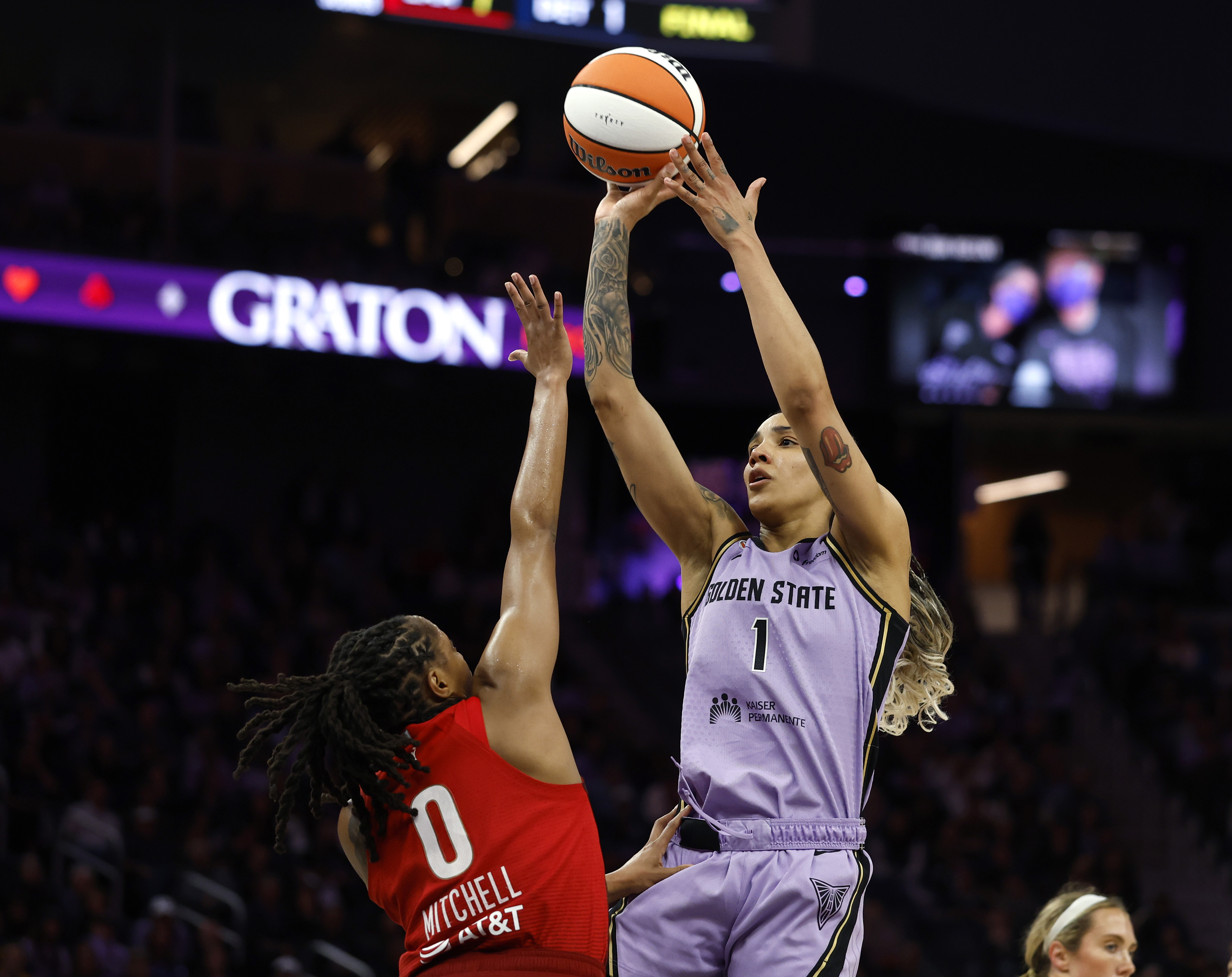 Golden State Valkyries' Gabby Williams (1) takes a shot against...