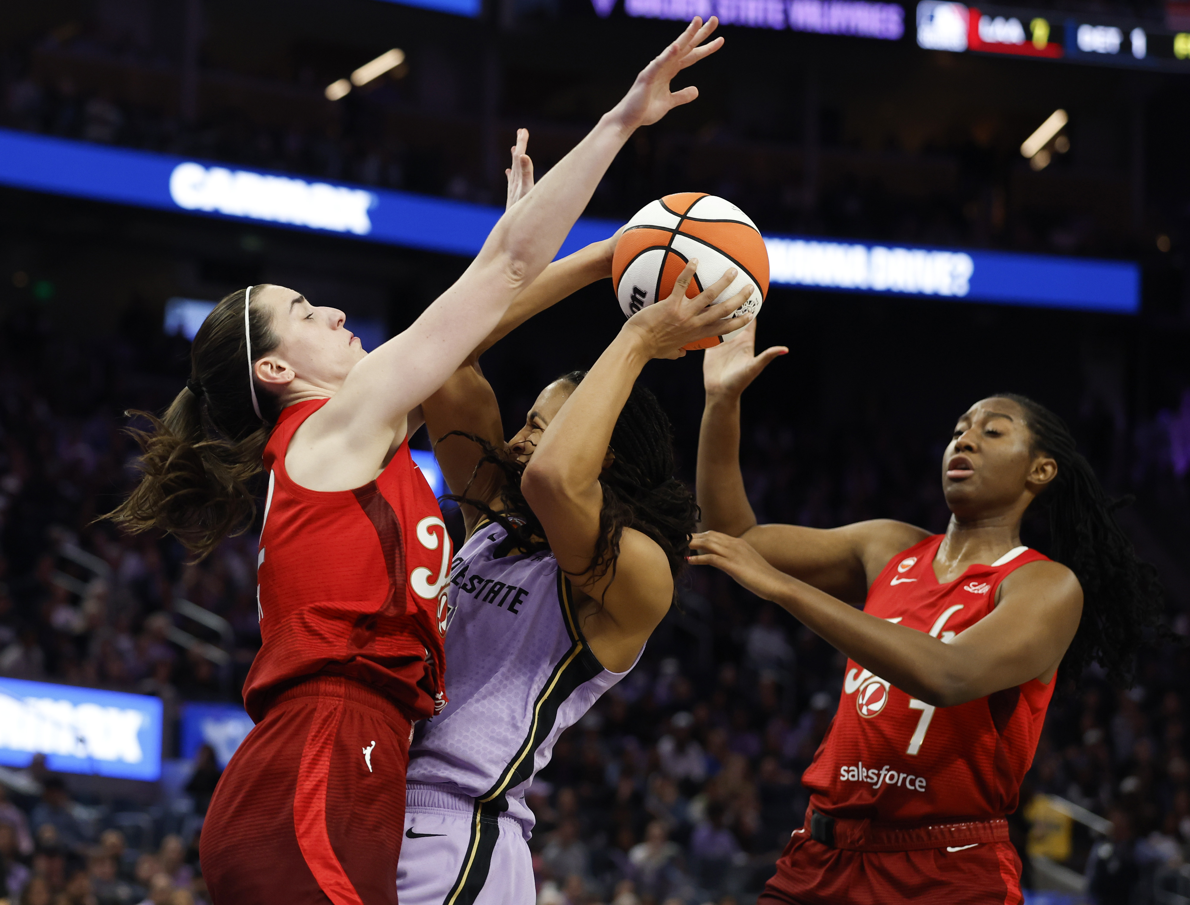Indiana Fever's Caitlin Clark (22) and Indiana Fever's Aliyah Boston...