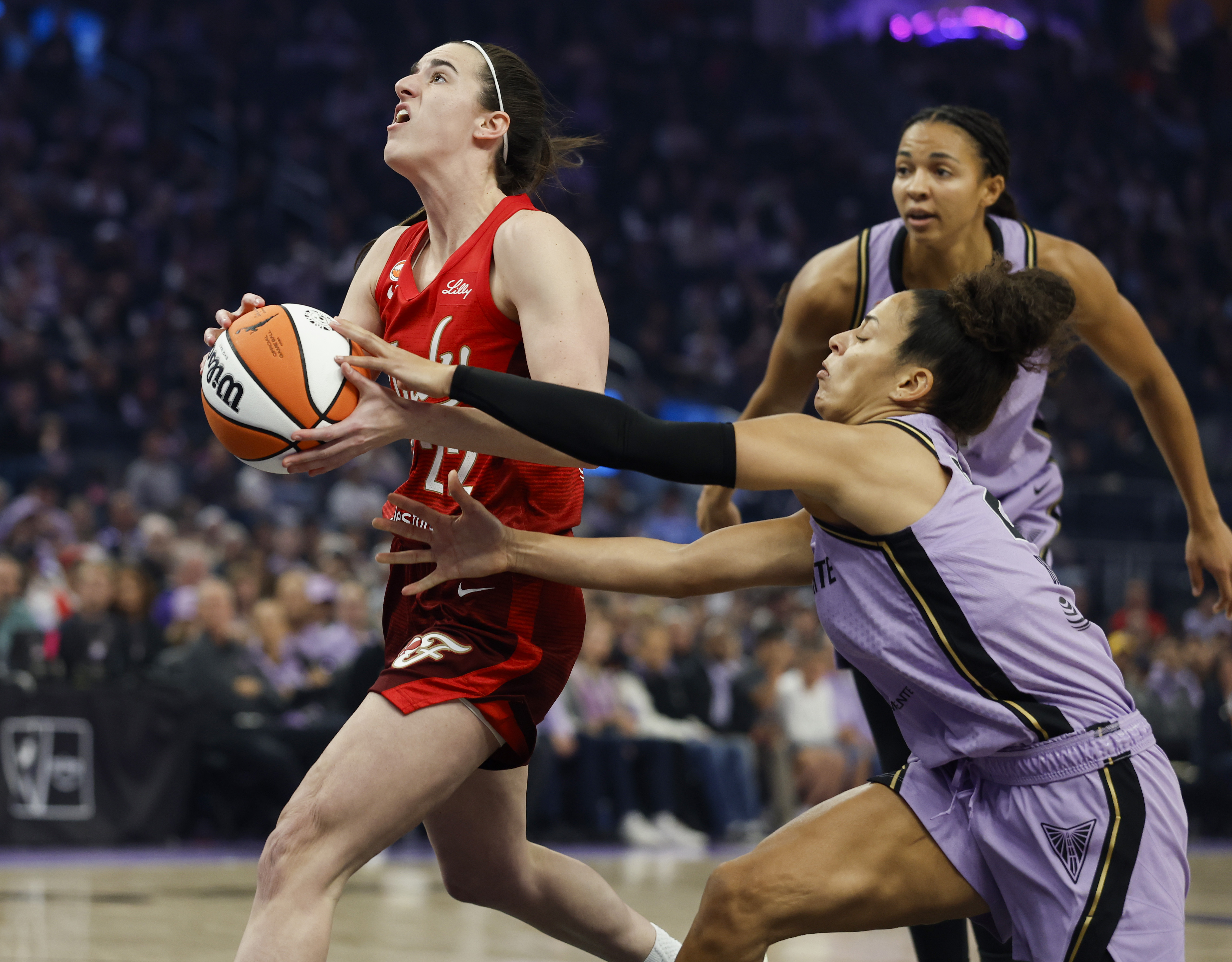 Golden State Valkyries' Veronica Burton (22) strips the ball away...