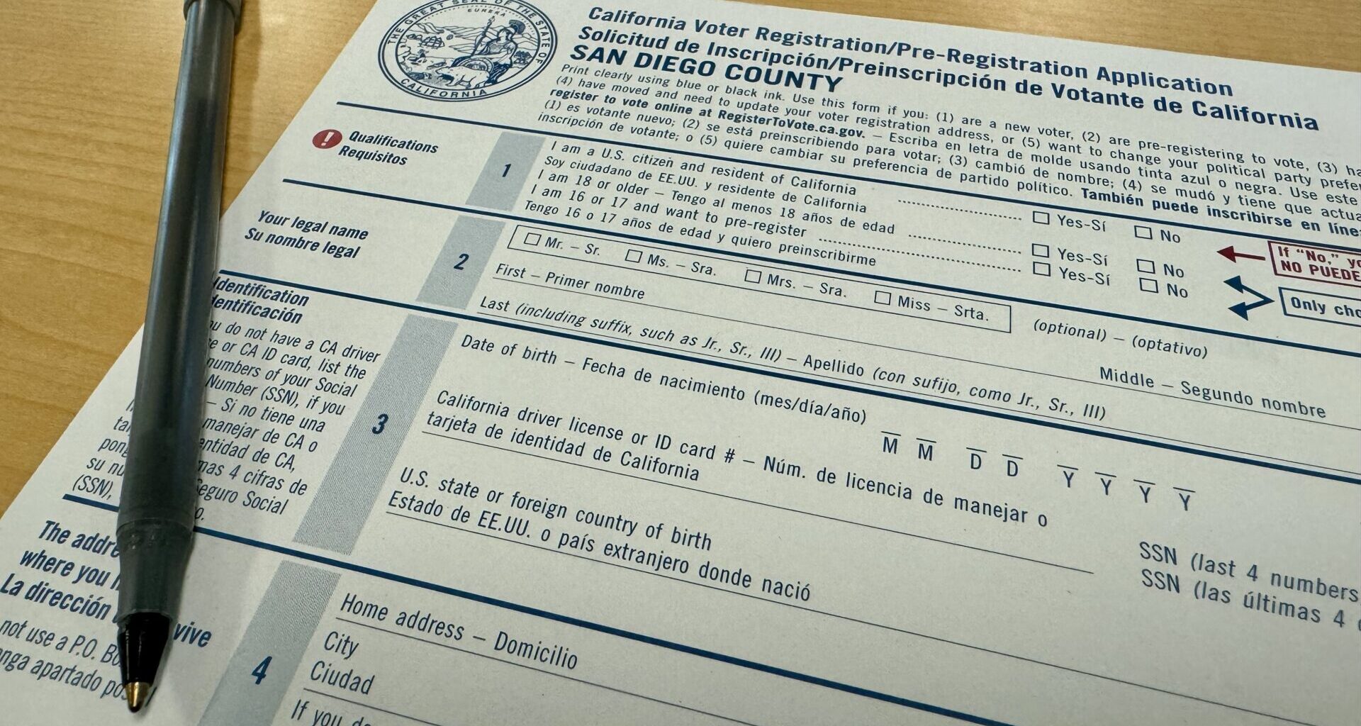 Pen and voter registration form.