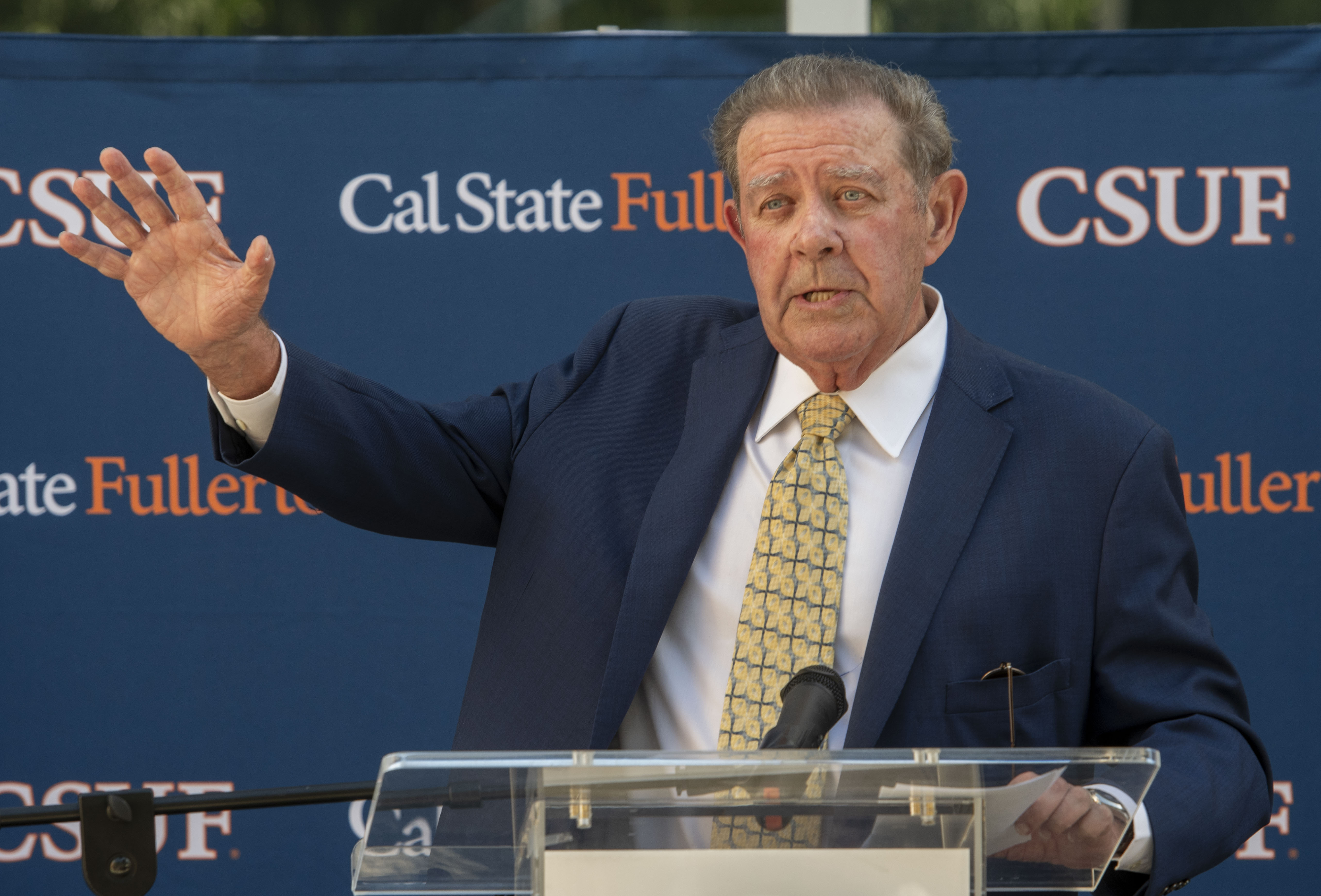 Terry M. Giles delivers remarks at the beam ceremony for...