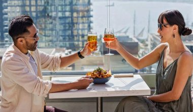 Guests enjoying drinks on The Rooftop at Carté Hotel San Diego