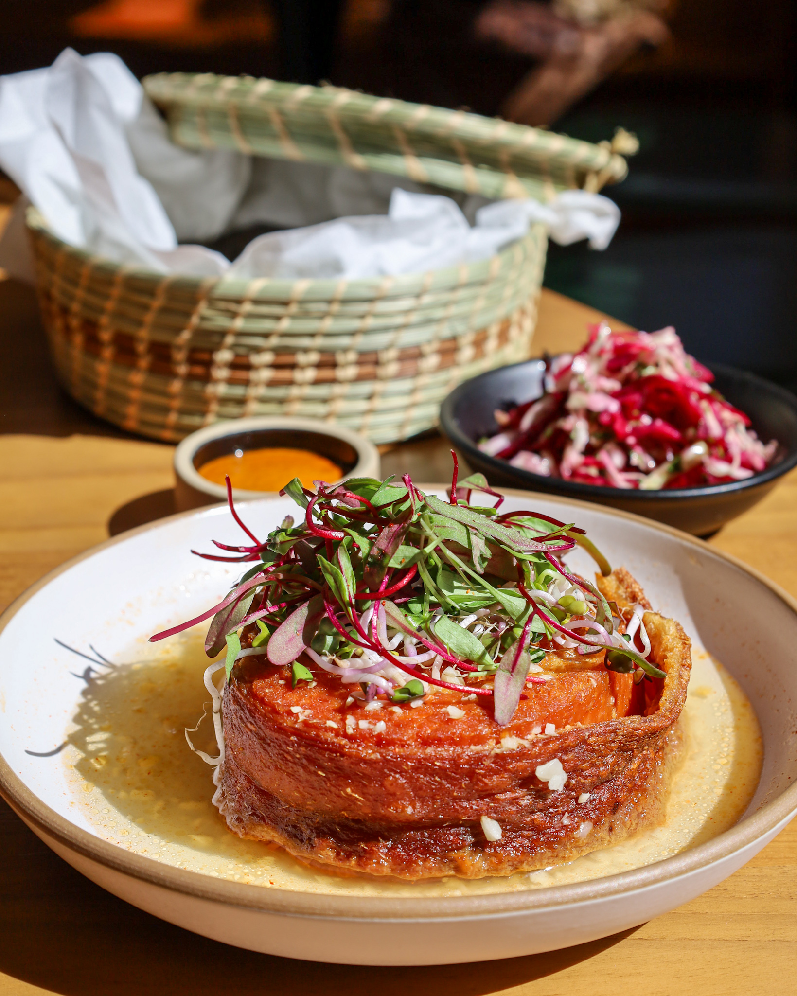 Chicharrón at Broken Spanish Comedor topped with microgreens