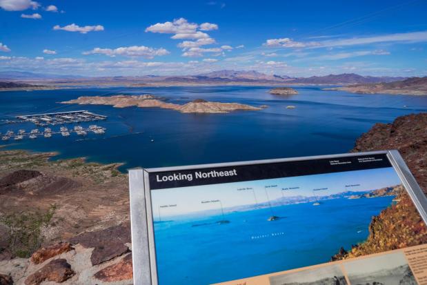 A informational map shows Lake Mead at a higher water level than is seen on Wednesday, Apr. 01, 2026, Boulder City, Nev. (AP Photo/Ty ONeil)