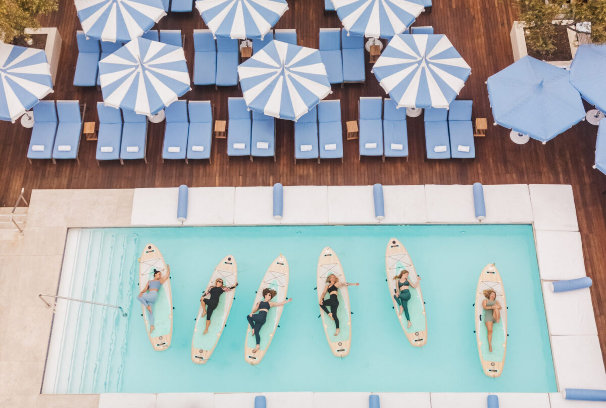 rooftoop paddleboard yoga at The Maybourne Beverly Hills