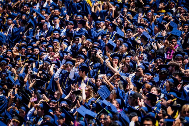 UC Berkeley undergraduate and graduate students of the Class of 2026 celebrate during their commencement ceremony at California Memorial Stadium in Berkeley, Calif., Saturday, May 16, 2026. (Ray Chavez/Bay Area News Group)