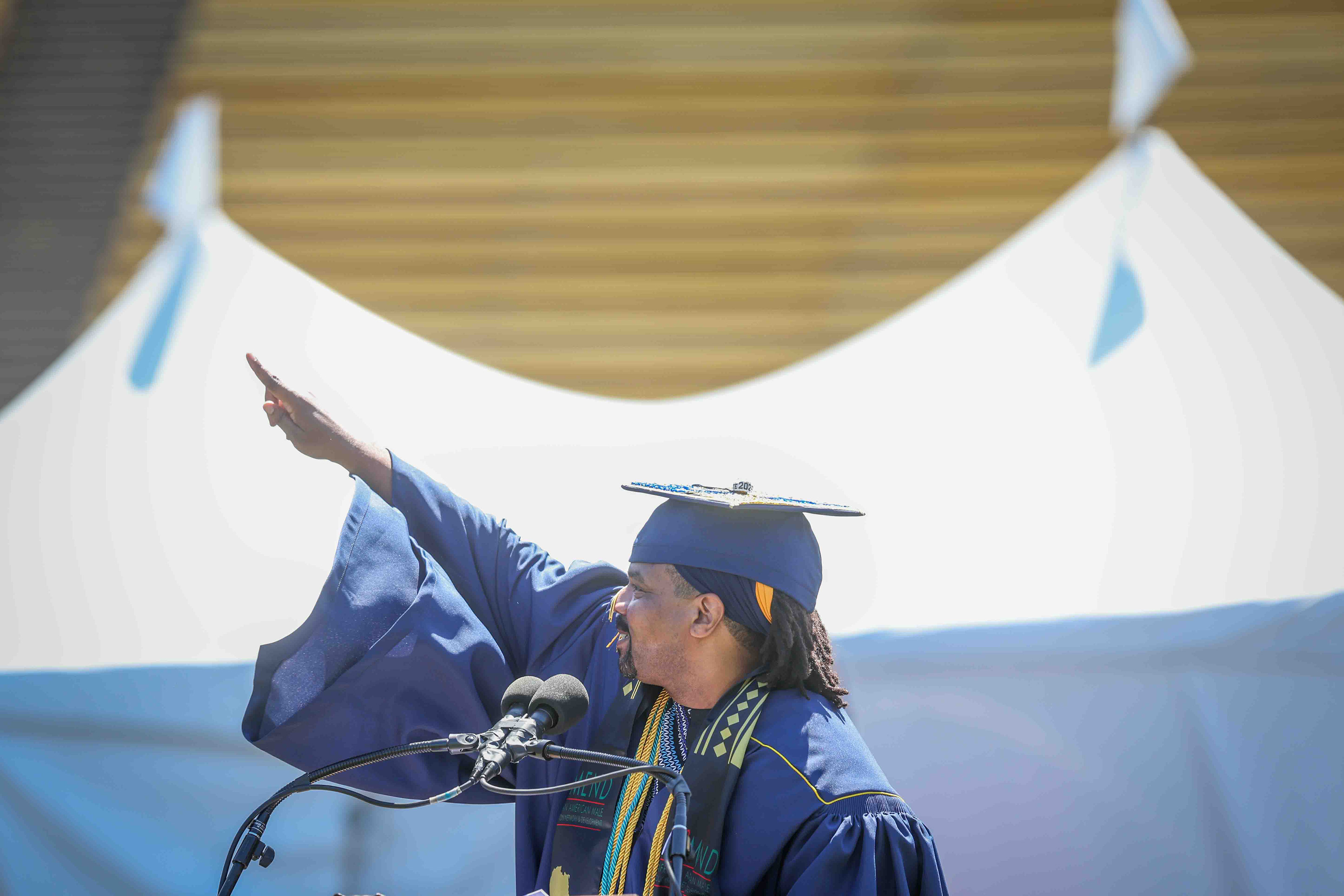 University Medalist Charles Long, 43, delivers the keynote speech to...