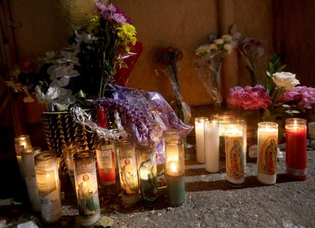 A memorial is seen on International Boulevard near 85th Avenue in Oakland, Calif., on Monday, May 18, 2026. Three people died when a speeding pickup truck crashed into a crowd of people in East Oakland late Saturday, authorities said. (Jane Tyska/Bay Area News Group)