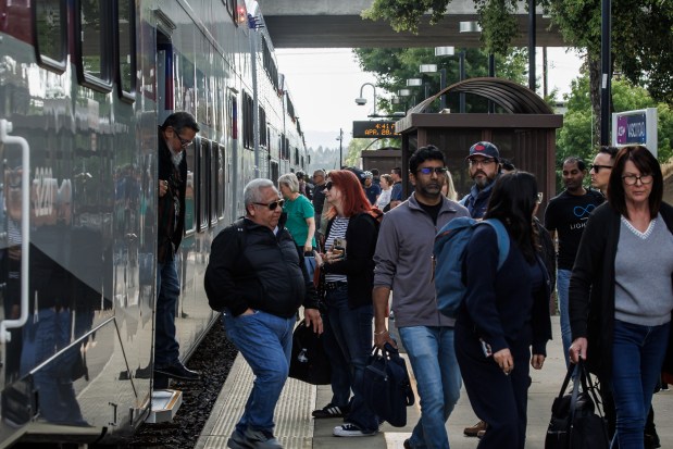 Commuters board and disembark an ACE train at the Vasco Road station in Livermore, Calif., Tuesday, April 28, 2026. (Dai Sugano/Bay Area News Group)