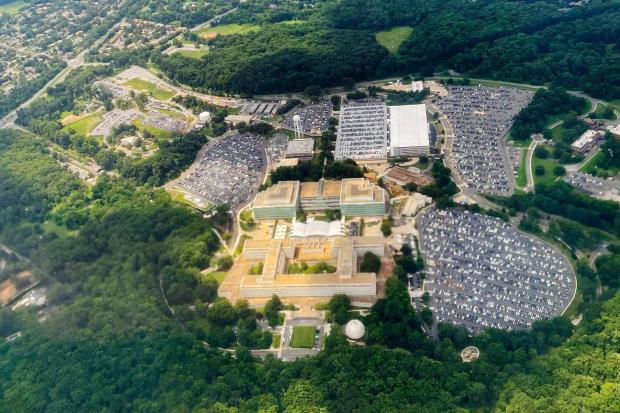 FILE - The Central Intelligence Agency (CIA) Headquarters, is seen from a commercial airliner as it files over the CIA campus in Langley, Va., July 24, 2023. (AP Photo/Pablo Martinez Monsivais, File)