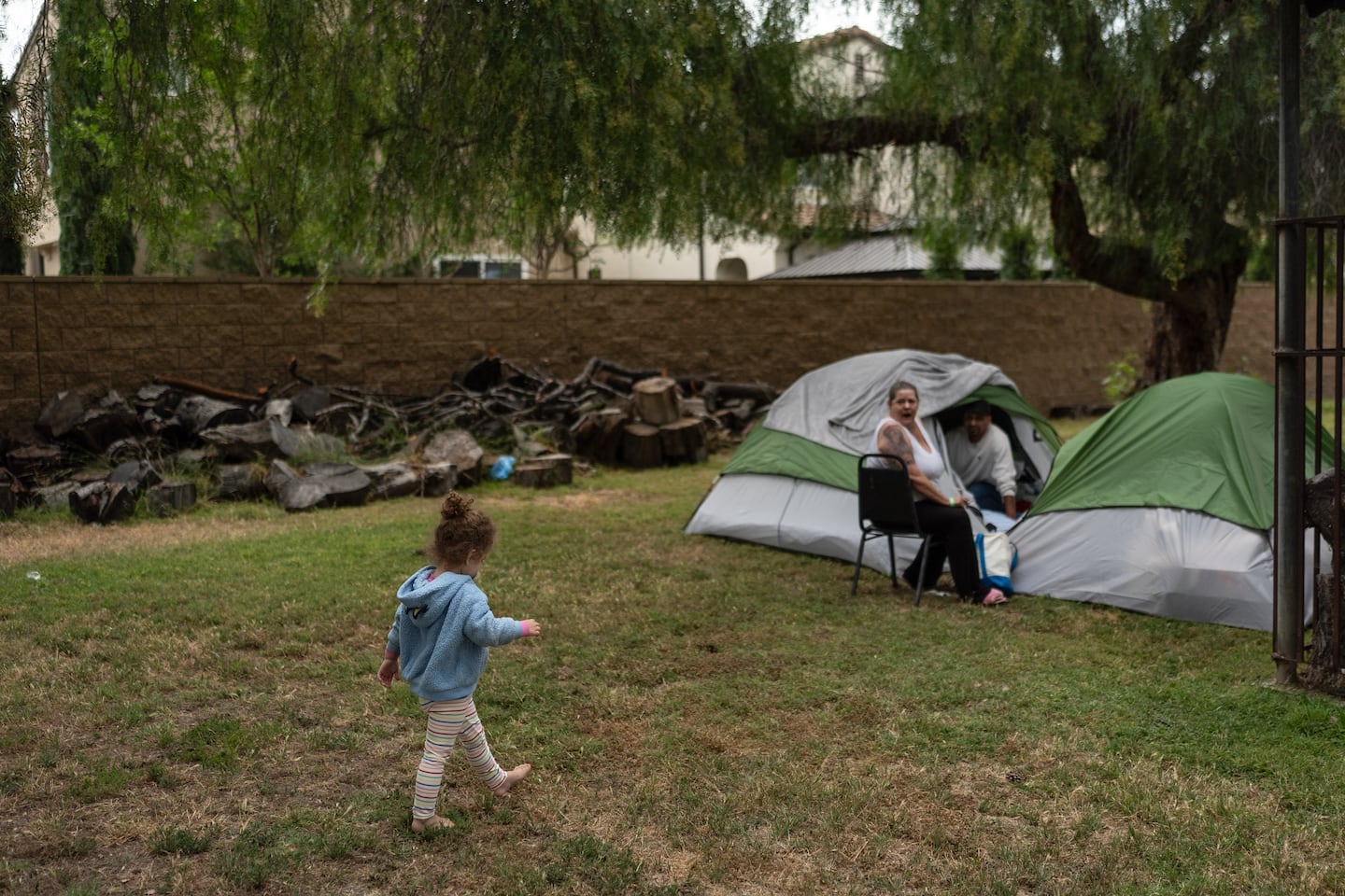 Lilly Lopez, 3, walked toward her father at a shelter at the Elks Lodge in Garden Grove, Calif., Tuesday, May 26, 2026, set up for those who were living near a damaged hazardous chemical tank.