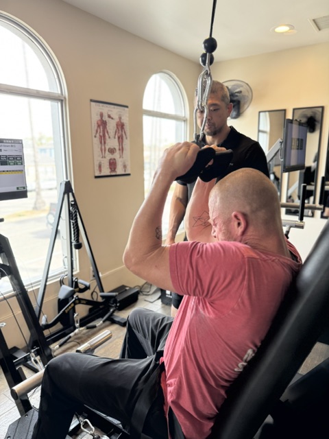 Staffers at EvolutionWise Longevity Studio, which opened recently in Naples,...