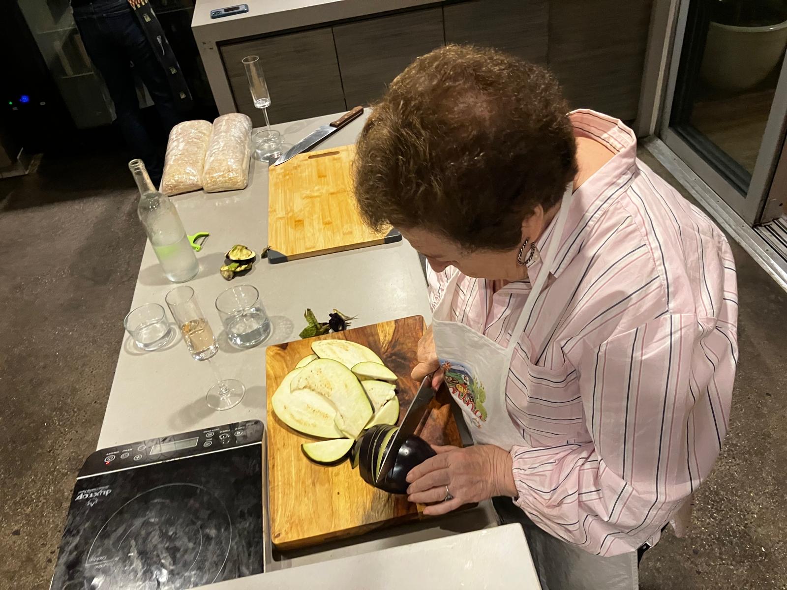 Mary Frances Cali Ruiz demonstrates cooking techniques. (Photo courtesy of...