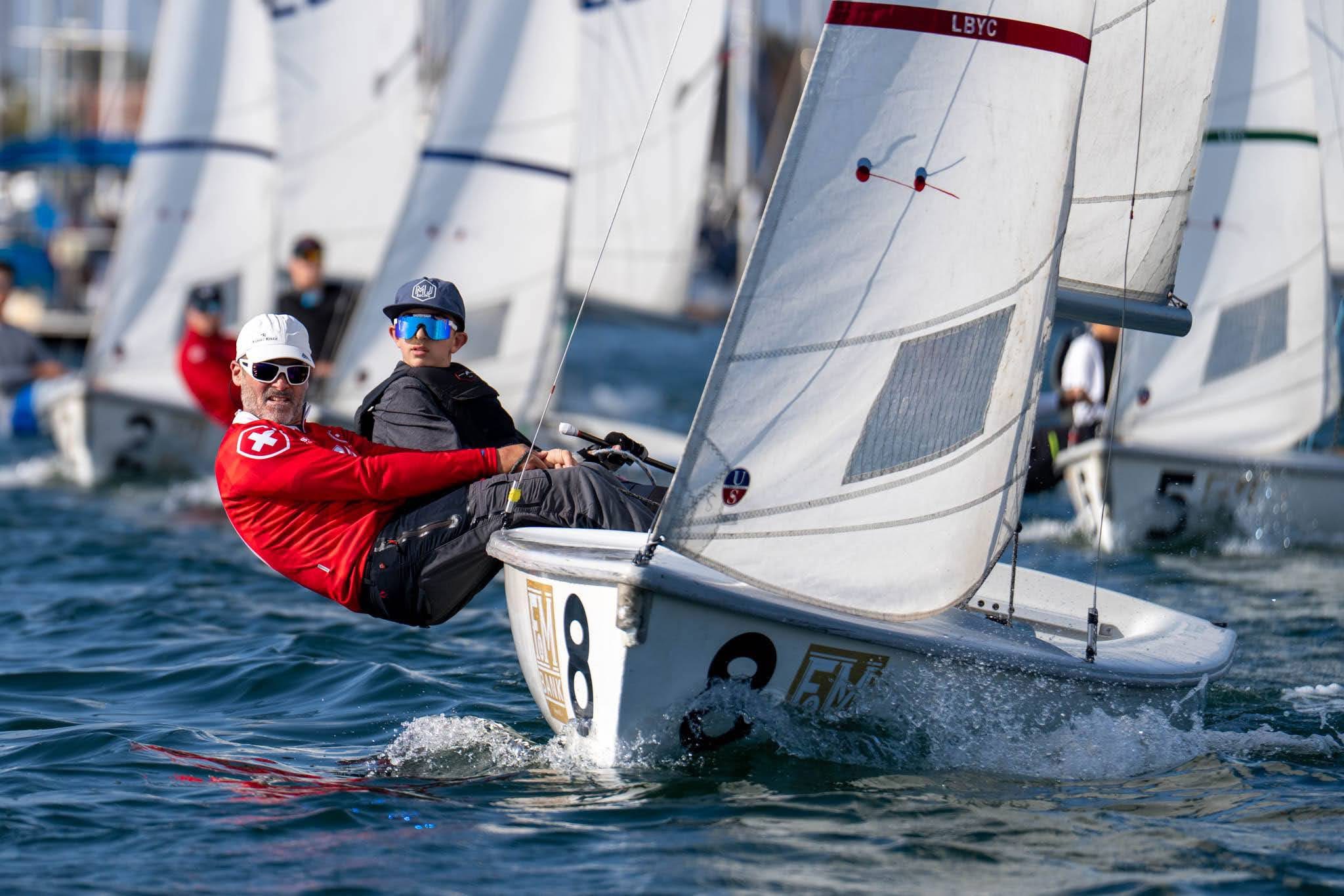 Long Beach Yacht Club Junior Jack Brodsky, 14, with Eric...