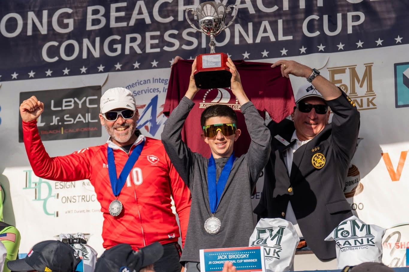Long Beach Yacht Club Junior Jack Brodsky, 14, with Eric...