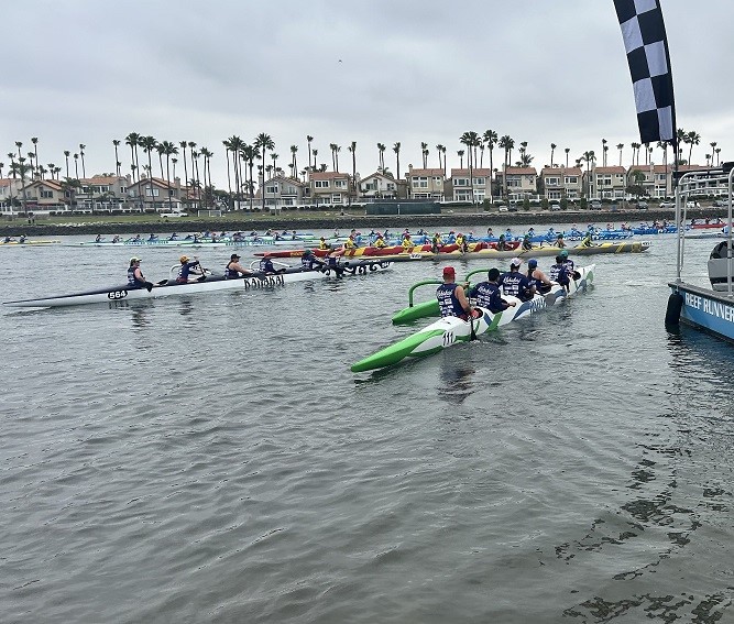 Kahakai outrigger crews launch in Marine Stadium at the Battle...