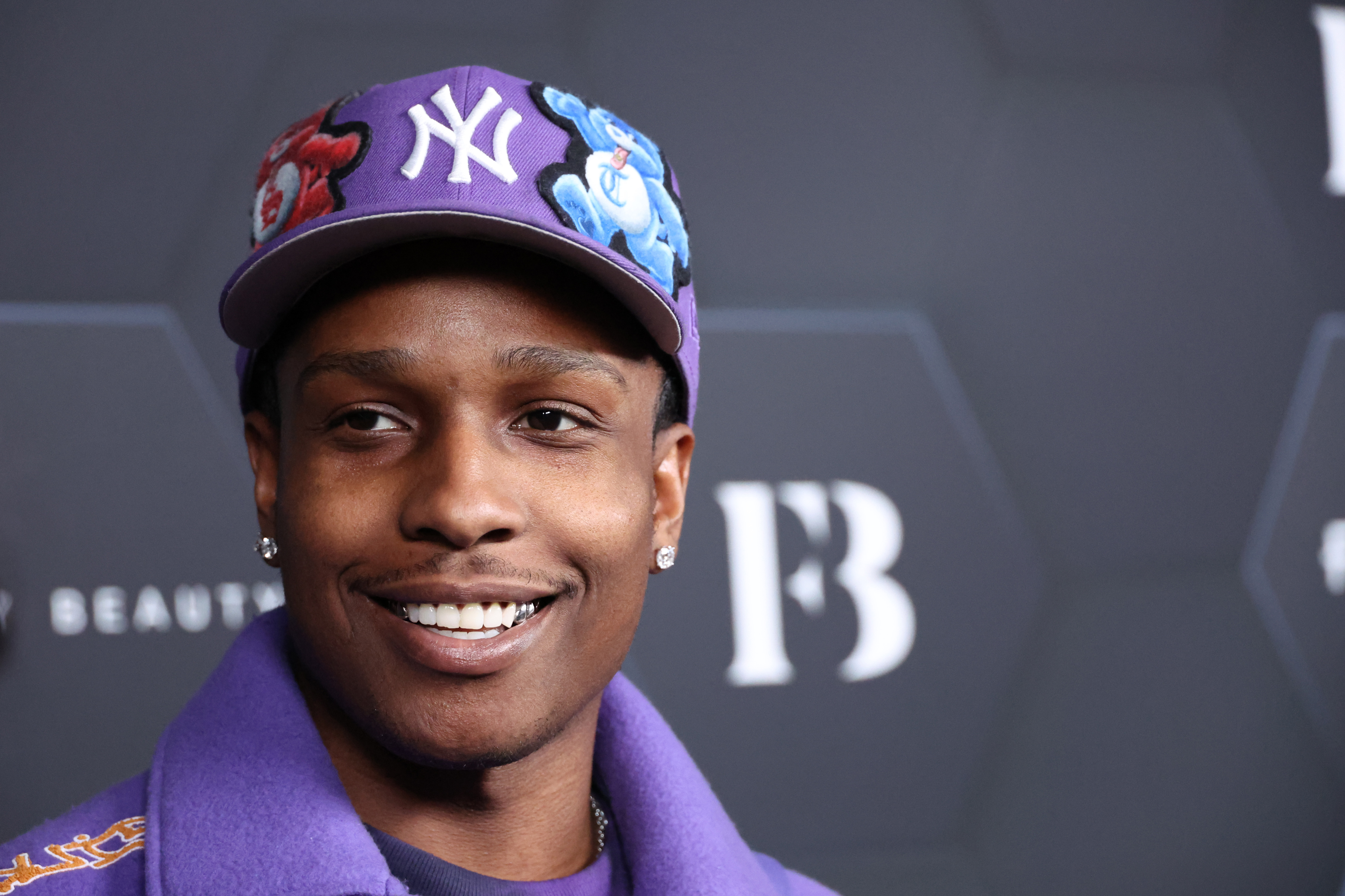 A$AP Rocky poses for a picture as Rihanna celebrates her...