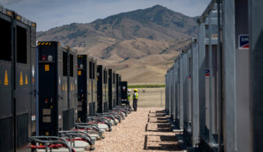 Workers are seen at the Pastoria Battery Energy Storage System facilities on April 16 in Arvin, Calif. Credit: Eric Thayer/Los Angeles Times via Getty Images