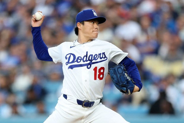 Dodgers starting pitcher Yoshinobu Yamamoto throws to the plate during the first inning of a game against the San Francisco Giants on Tuesday, May 12, 2026, at Dodger Stadium. (Photo by Sean M. Haffey/Getty Images)