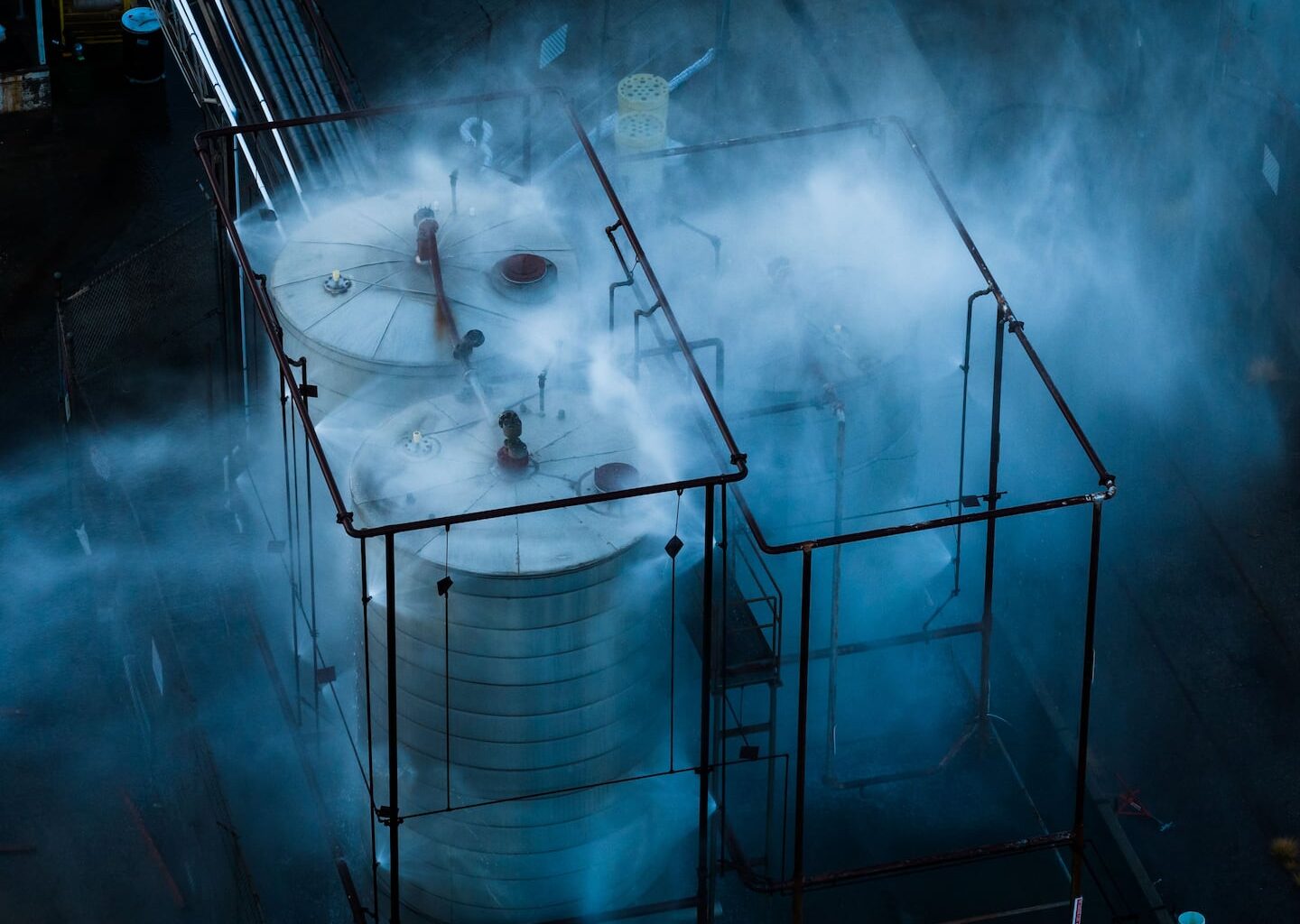 Water is sprayed on a tank that overheated at an aerospace plant in Garden Grove, Calif., on May 22, 2026.