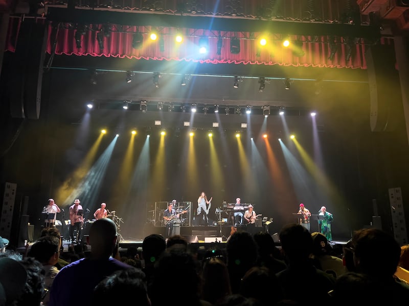 Solo singer and band on stage