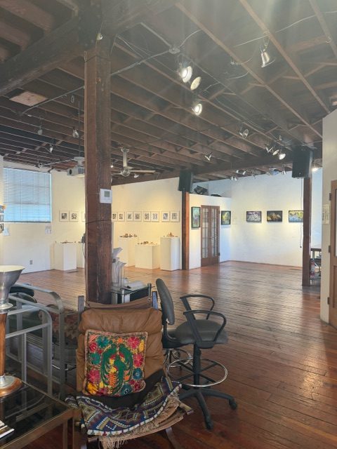 The Loft at Liz’s gallery space with wooden floors and contemporary art exhibition installation