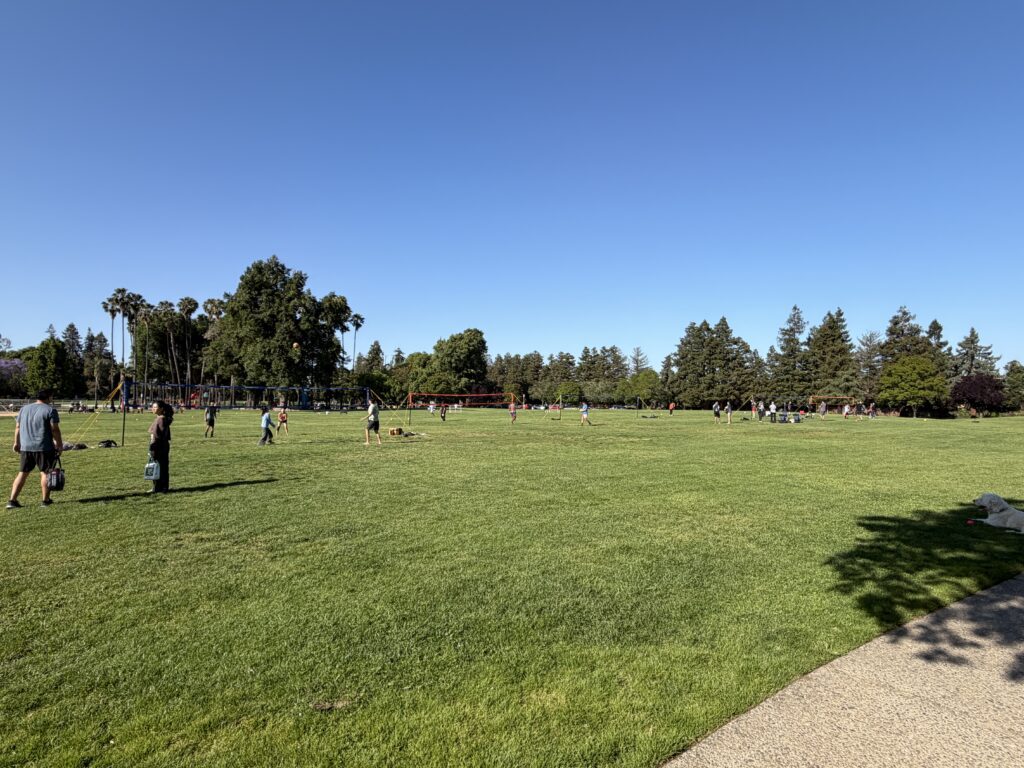 People setting up to play sports at a park in Sunnyvale, California
