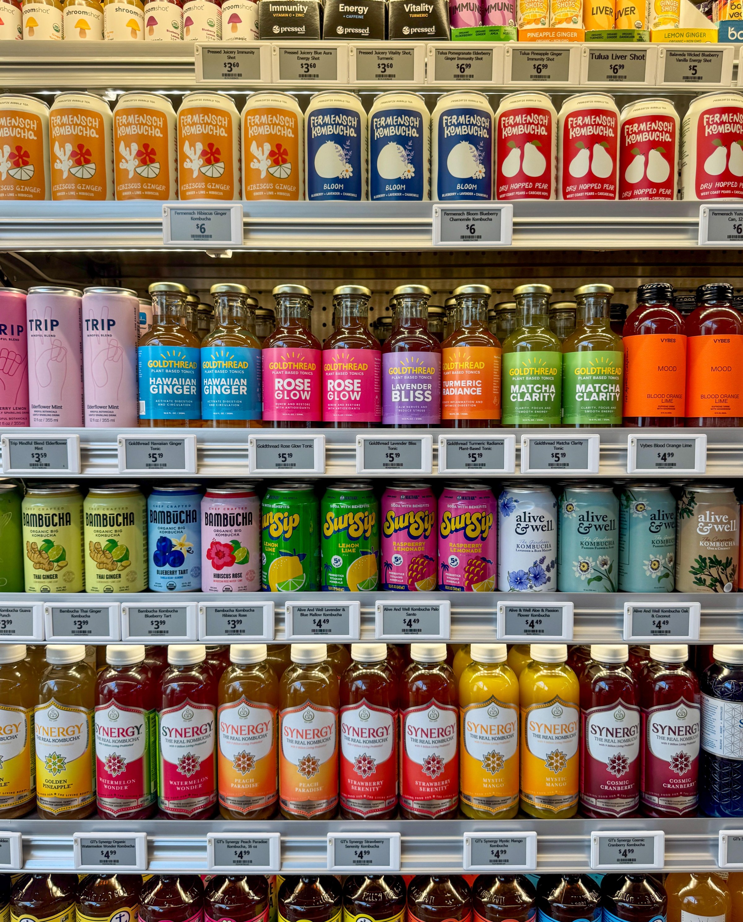 Rows of kombucha and other drinks at Laurel Supply.