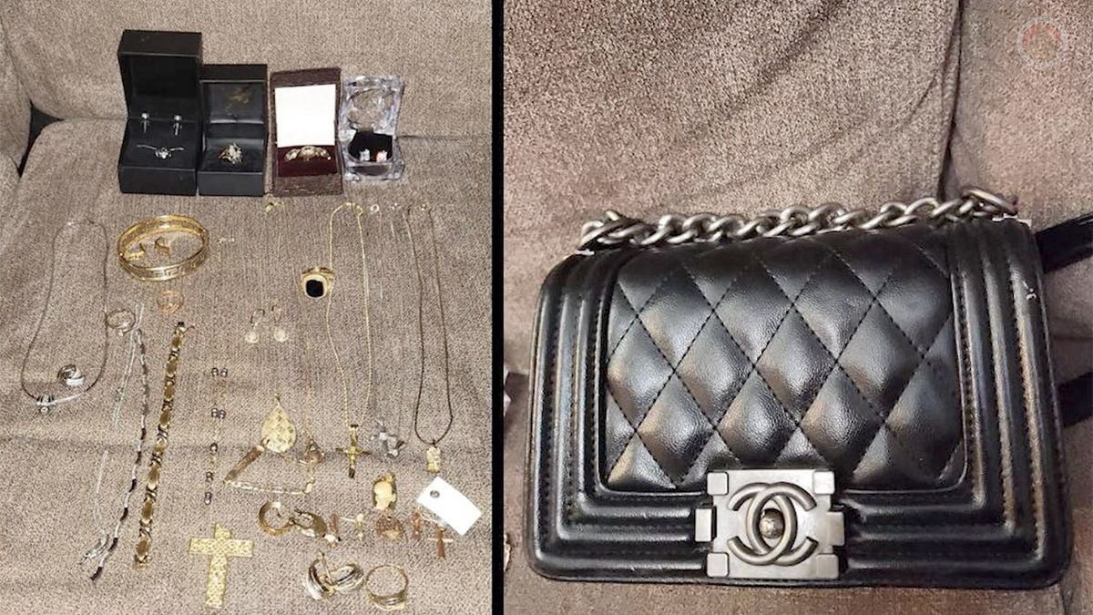 Jewelry, watches and a black Chanel handbag displayed as evidence in a burglary investigation.