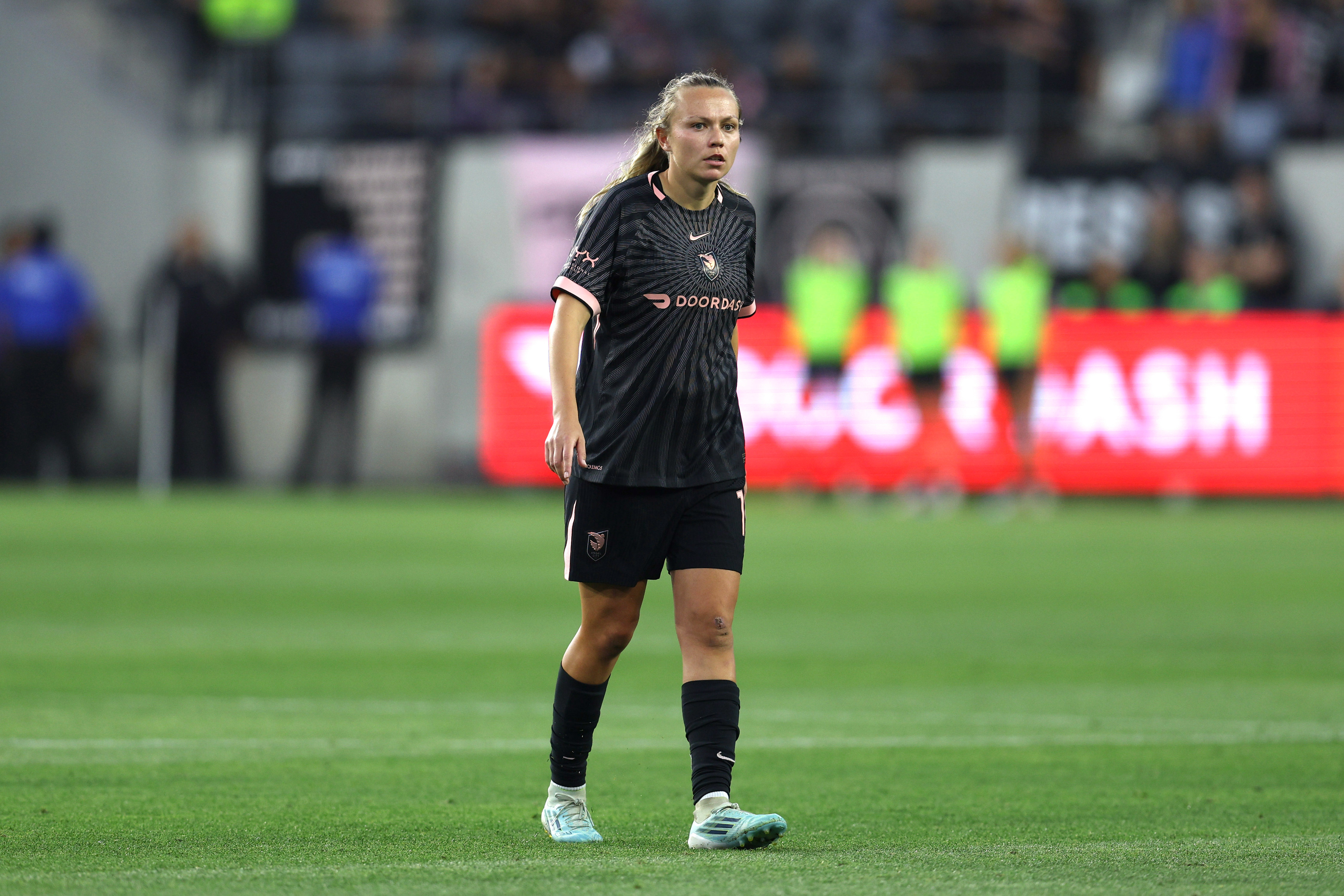 Angel City FC forward Claire Emslie looks on against the...